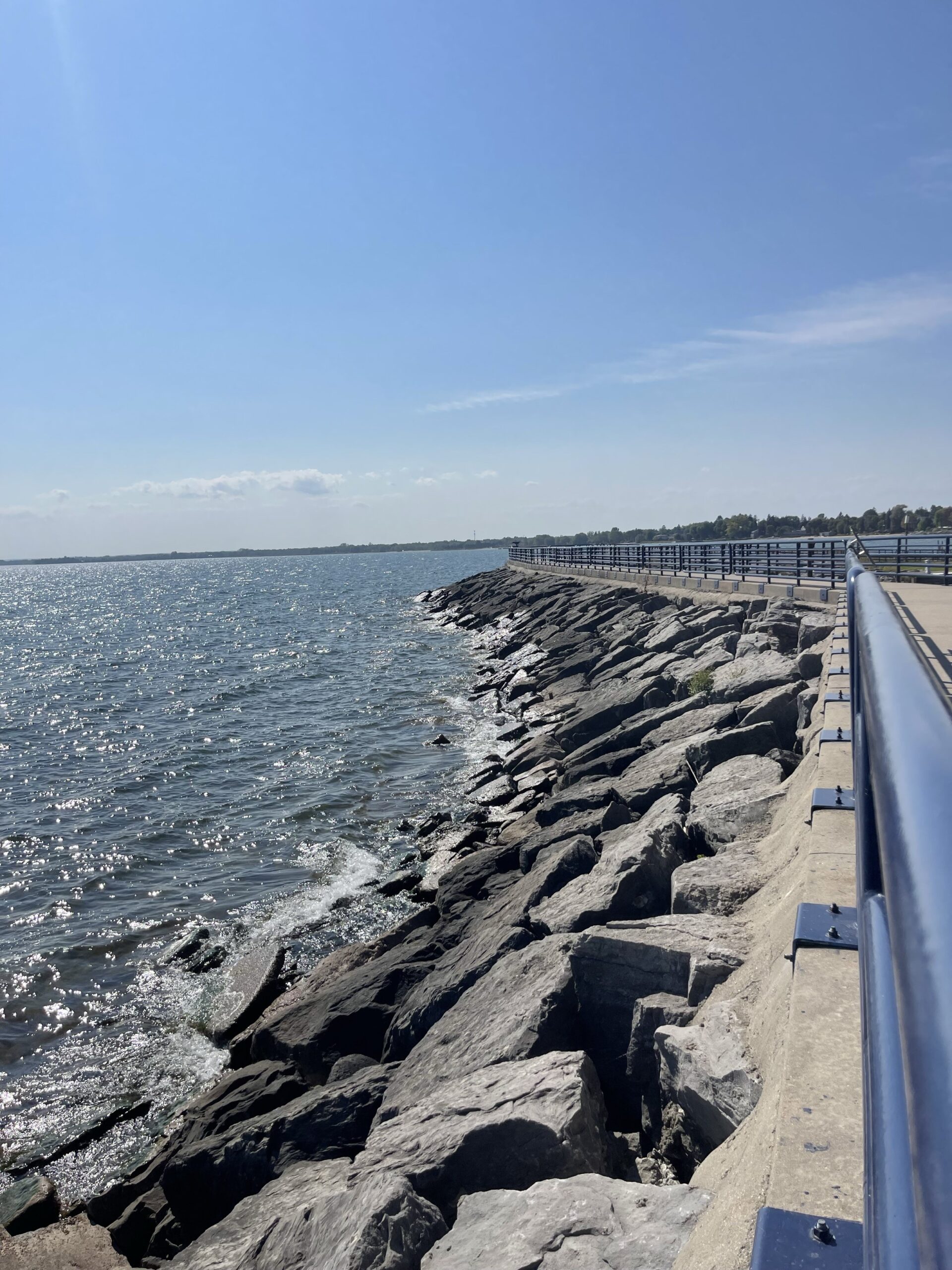 Picture of rock wall and walkway with water