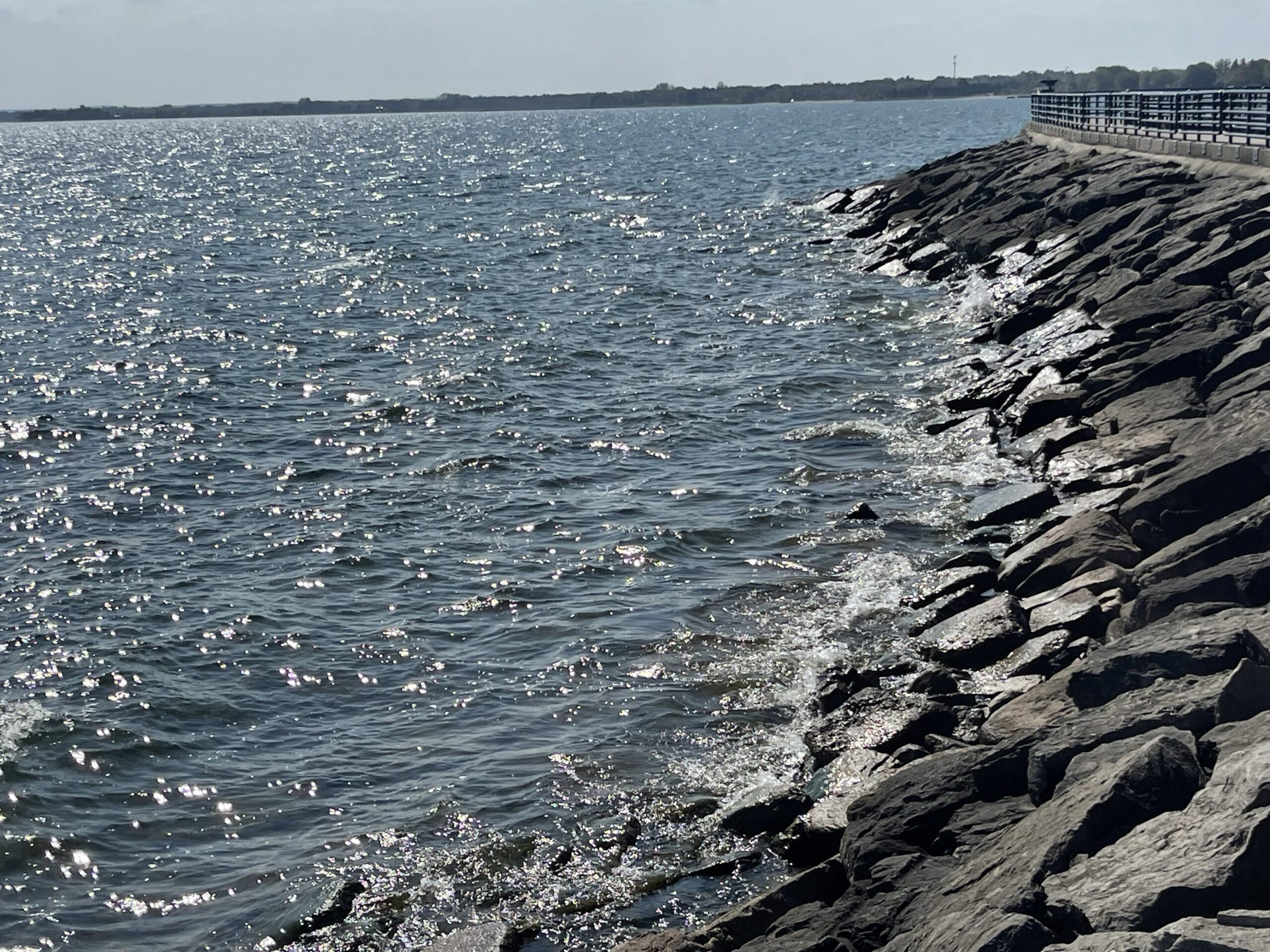 Picture of rock wall and walkway with water